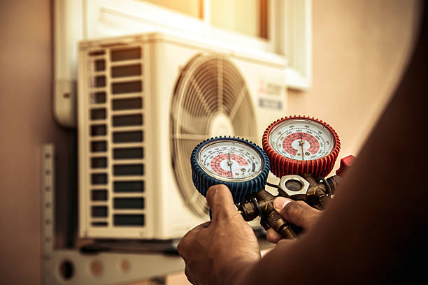 Professional Air Conditioning Service technician working in Beaver, UT